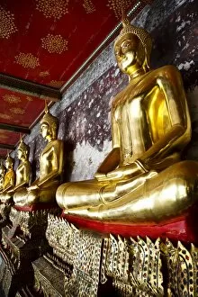 Bangkok Gallery: Buddha statues surrounding Wat Suthat, Bangkok, Thailand, Southeast Asia, Asia