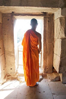 Cambodian Culture Collection: A Buddhist monk exploring the Angkor Archaeological Complex, UNESCO World Heritage Site