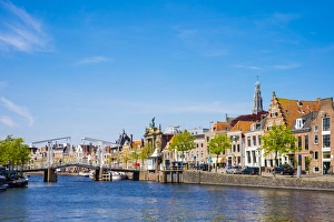 Buildings along the Spaarne River with Gravestenenbrug drawbridge, Haarlem, North Holland Buildings along the Spaarne River with Gravestenenbrug drawbridge, Haarlem, North Holland
