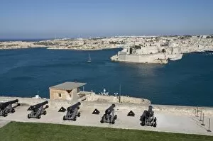 Barracca Gallery: Cannon in Barracca Gardens, Fort St. Angelo across the water, Valletta