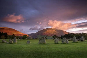Ancient Civilisation Gallery: Castlerigg Stone Circle in autumn at sunrise with Blencathra bathed in dramatic dawn light