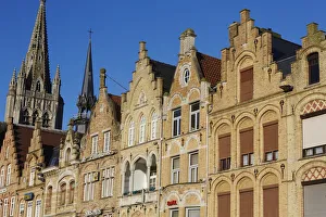 Cathedral spire and Flemish houses in Ypres, West Flanders, Belgium, Europe Cathedral spire and Flemish houses in Ypres, West Flanders, Belgium, Europe