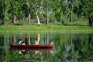 Children canoeing in Annaburroo Billabong at Mary River Crossing near the Arnhem Highway Children canoeing in Annaburroo Billabong at Mary River Crossing near the Arnhem Highway