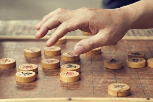 Chinese chess board and players hand, Huangshan City (Tunxi), Anhui Province Chinese chess board and players hand, Huangshan City (Tunxi), Anhui Province
