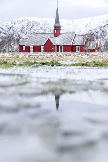 Church of Flakstad reflected in a pond in winter, Nordland county, Lofoten Islands, Norway, Scandinavia, Europe Church of Flakstad reflected in a pond in winter, Nordland county, Lofoten Islands, Norway, Scandinavia, Europe
