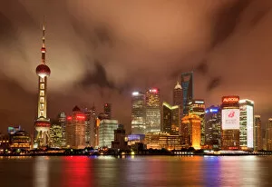 Skylines Gallery: City skyline at night with Oriental Pearl Tower and Pudong skyscrapers across the Huangpu River