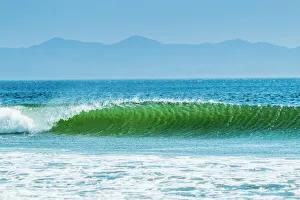 Classic curling shore break surf wave, typical of this coast, Playa Hermosa, San Juan del Sur, Rivas Province Classic curling shore break surf wave, typical of this coast, Playa Hermosa, San Juan del Sur, Rivas Province
