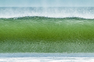 Classic tubular shore break surfing wave typical of this region, Playa Hermosa, San Juan del Sur, Rivas Province Classic tubular shore break surfing wave typical of this region, Playa Hermosa, San Juan del Sur, Rivas Province