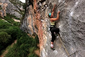 Active Gallery: Climber makes her way up one of the rock faces of the celebrated Mascun Gorge