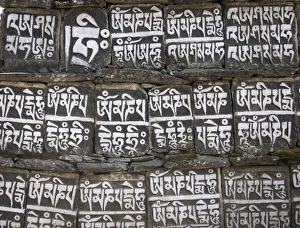 Close up of Mani stones along one of the trekking trails in the Sagarmatha National Park Close up of Mani stones along one of the trekking trails in the Sagarmatha National Park