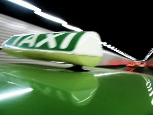 Tunnel Prints: Close-up Taxi Sign Print