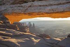 Close up view of canyon through Mesa Arch with glowing arch, Canyonlands National Park Close up view of canyon through Mesa Arch with glowing arch, Canyonlands National Park