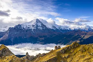 Cloudy sky over Mount Eiger seen from high mountains above Grindelwald in autumn Cloudy sky over Mount Eiger seen from high mountains above Grindelwald in autumn