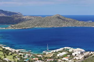 Images Dated 19th April 2014: Coast and resort of Elounda, Spinalonga Island, Gulf of Mirabello, Crete, Greek Islands, Greece