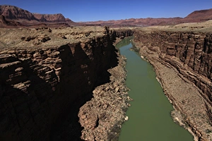 The Colorado River winds through the sheer cliffs of Marble Canyon The Colorado River winds through the sheer cliffs of Marble Canyon