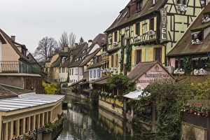Colored houses reflected in river Lauch at Christmas time, Petite Venise, Colmar Colored houses reflected in river Lauch at Christmas time, Petite Venise, Colmar