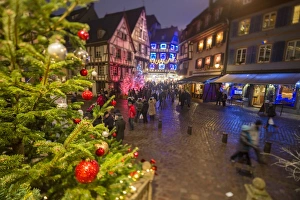 Colourful lights on Christmas trees and ornaments at dusk, Colmar, Haut-Rhin department Colourful lights on Christmas trees and ornaments at dusk, Colmar, Haut-Rhin department