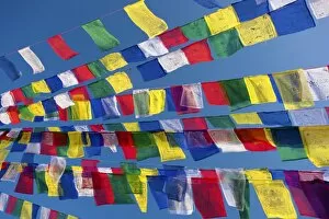Kathmandu Gallery: Colourful prayer flags against clear blue sky at Bodhnath Stupa (Boudhanth) (Boudha)