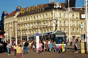 Prints of Commuters and tram in Ban Jelacic Square, Zagreb, Croatia, Europe Croatia Prints: Ban Jelacic Square Print, Zagreb Tram Scene