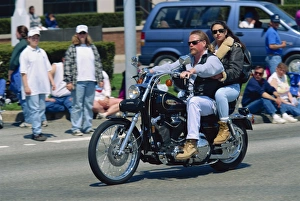 Couple on a Harley Davidson motorbike in Newport Couple on a Harley Davidson motorbike in Newport