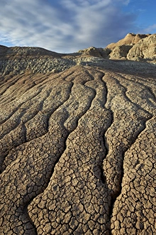 Cracks in eroded badlands, Badlands National Park, South Dakota, United States of America Cracks in eroded badlands, Badlands National Park, South Dakota, United States of America