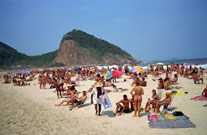 Crowds of people sunbathing on Copacabana Beach in Rio de Janeiro, Brazil, South America Crowds of people sunbathing on Copacabana Beach in Rio de Janeiro, Brazil, South America