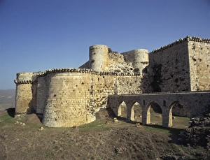 Crusader castle at Crac des Chevaliers, UNESCO World Heritage Site, Syria, Middle East Crusader castle at Crac des Chevaliers, UNESCO World Heritage Site, Syria, Middle East