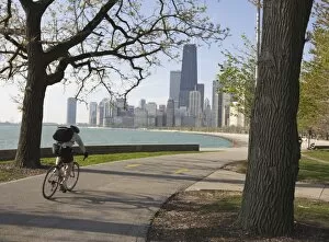 Related Images Gallery: Cyclist by Lake Michigan shore, Gold Coast district, Chicago, Illinois