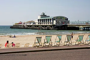Prints of Deckchairs, beach and pier, Bournemouth, Dorset, England, United Kingdom, Europe Dorset Prints: Bournemouth Pier Print: Deckchairs and Beach Scene