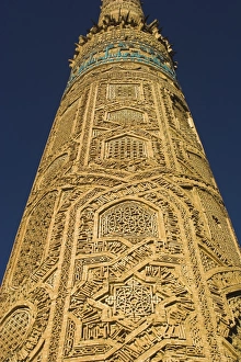 Detail of decoration on minaret including Kufic inscription in turquoise glazed tiles Detail of decoration on minaret including Kufic inscription in turquoise glazed tiles