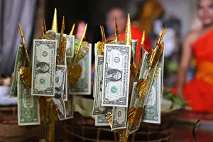 US dollars on Buddhist money tree to make merit and donate to local temple US dollars on Buddhist money tree to make merit and donate to local temple
