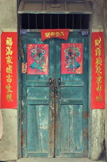 Door with Chinese art and characters, Xingping, Guangxi Province, China, Asia Door with Chinese art and characters, Xingping, Guangxi Province, China, Asia