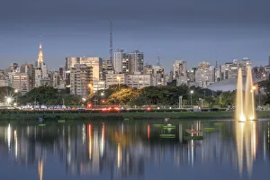 The downtown urban skyline reflected in Lago das Garcas lake at twilight, Ibirapuera Park, Sao Paulo, Brazil The downtown urban skyline reflected in Lago das Garcas lake at twilight, Ibirapuera Park, Sao Paulo, Brazil