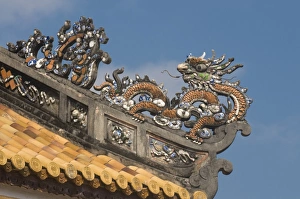 Dragons on top of the roof of the Halls of the Mandarins, Hue, Vietnam Dragons on top of the roof of the Halls of the Mandarins, Hue, Vietnam