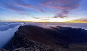 Fuerteventura Gallery: Dramatic sky at dawn over Pico de la Zarza mountain peak in mist, Jandia Peninsula, Fuerteventura