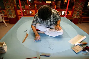 Drawing a mandala in the Temple of the Thousand Buddhas, Dashang Kagyu Ling congregation Drawing a mandala in the Temple of the Thousand Buddhas, Dashang Kagyu Ling congregation