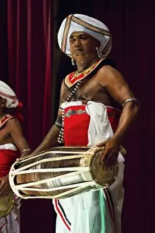Images Dated 2nd October 2011: Drummer in a Pancha Thuryas Kandyan dance orchestra at tourist show in the Kandyan Arts