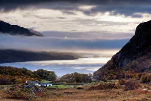 Early morning mist hanging over Loch Maree with Tollie Farm in foreground Early morning mist hanging over Loch Maree with Tollie Farm in foreground
