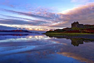 Water Surface Gallery: Early morning view of Castle Tioram and Loch Moidart as dawn breaks in a warm colorful