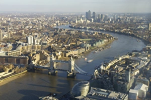 Elevated view of the River Thames looking East towards Canary Wharf with Tower Bridge in the foreground, London Elevated view of the River Thames looking East towards Canary Wharf with Tower Bridge in the foreground, London