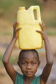 Fetching water in Mulago, Kampala, Uganda, Africa Fetching water in Mulago, Kampala, Uganda, Africa