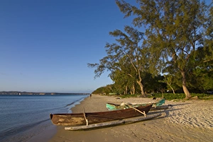 Fishing boat lying on a beautiful beach near Diego Suarez (Antsiranana) Fishing boat lying on a beautiful beach near Diego Suarez (Antsiranana)