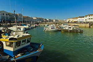 Fishing boats and yachts in the quays at this north coast town, Saint Martin de Re Fishing boats and yachts in the quays at this north coast town, Saint Martin de Re