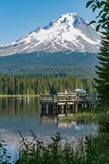 Hobbies Gallery: Fishing on Trillium Lake with Mount Hood, part of the Cascade Range, reflected in the still waters