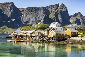 Fishing village on Reinefjorden, Saknesoya, Lofoten Islands, Norway, Scandinavia, Europe Fishing village on Reinefjorden, Saknesoya, Lofoten Islands, Norway, Scandinavia, Europe