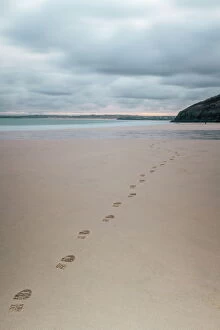 Tide Gallery: Footsteps in the sand, Carbis Bay beach, St. Ives, Cornwall, England, United Kingdom, Europe