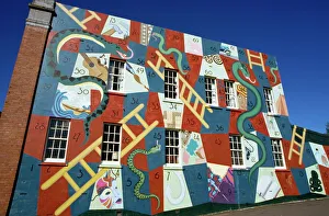The game of snakes and ladders painted on a wall of The game of snakes and ladders painted on a wall of