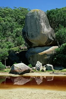 Eroded Gallery: Giant boulders and rocks above a coloured stream at Wilsons Promontory