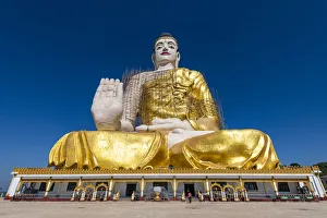 Giant sitting Buddha below the Kyaiktiyo Pagoda (Golden Rock), Mon state, Myanmar (Burma) Giant sitting Buddha below the Kyaiktiyo Pagoda (Golden Rock), Mon state, Myanmar (Burma)