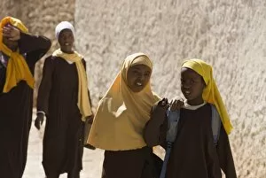 Girls stepping out of school in Harar, Ethiopia, Africa